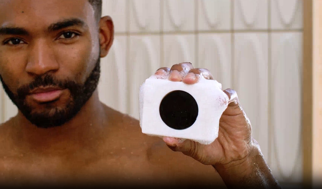 lumin pdp deep cleanse and scrub body bar in use 01