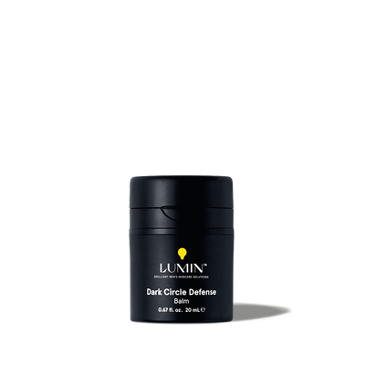 Lumin Dark Circle Defense Balm in black container, men's skincare product for reducing dark under-eye circles, 0.67 fl oz.
