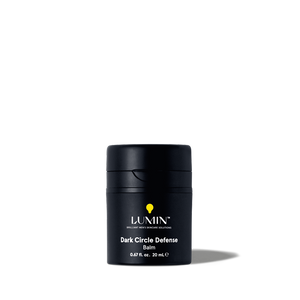 Lumin Dark Circle Defense Balm in black container, men's skincare product for reducing dark under-eye circles, 0.67 fl oz.