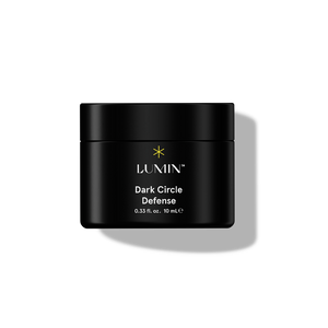 Lumin Dark Circle Defense eye cream jar, 10 mL, black container with yellow star logo for skincare and dark circle treatment.