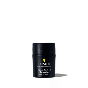 Lumin Instant Redness Corrector skincare product for men, 1.01 fl. oz. black travel-size container with yellow logo.