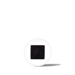 White pill with a black square imprint, medicine tablet for prescription or over-the-counter use.