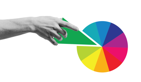 Hand pointing to green segment of a colorful pie chart with sections in blue, purple, pink, red, orange, and yellow, on white background.